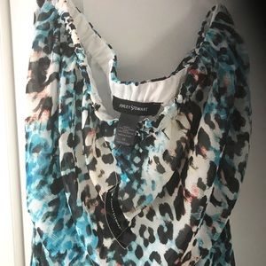 Strapless leopard print dress with elastic waist.